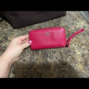Pink coach wristlet